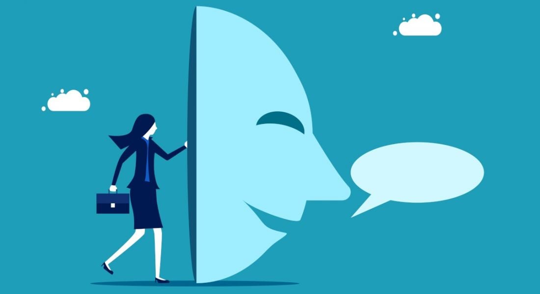 A cartoon built around a job scams concept showing a person hiding behind a giant mask that has an empty speech bubble in front of it.