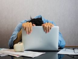 Photo collage showing a woman stressed at her desk thinking about work.