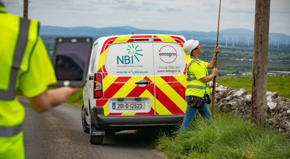 A van with the logos for Entegro and National Broadband Ireland is parked in a rural location.