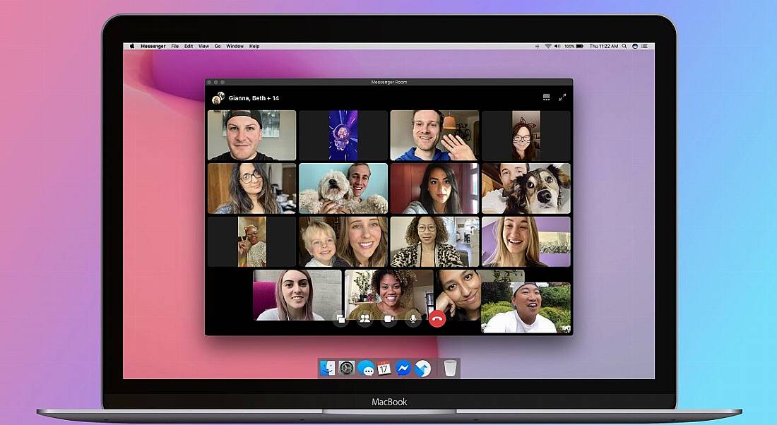 Dozens of people on a Messenger Rooms call on a laptop screen against a multicoloured background.