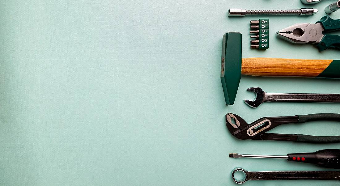 Set of tools against a blue background.