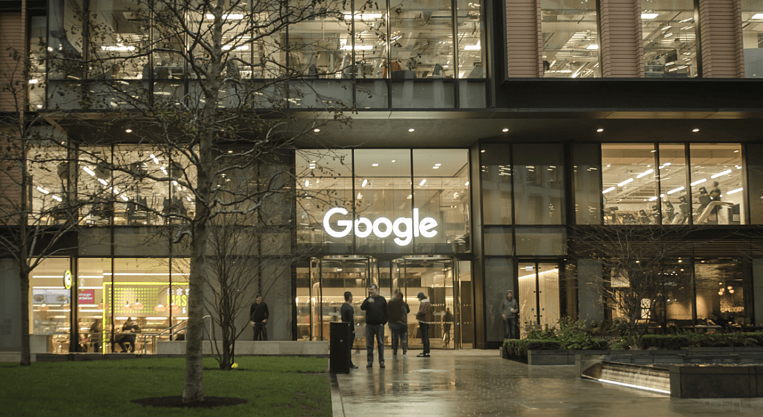 The Google logo on the front of an office building.