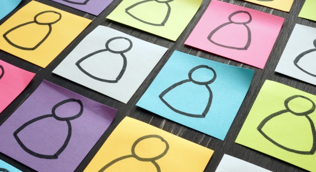 Coloured sticky notes with illustrations of people symbolising equality, diversity and inclusion.
