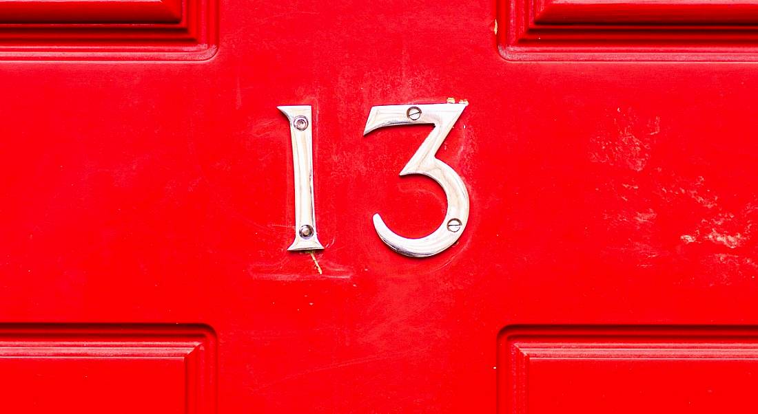 Number 13 on a bright red door.