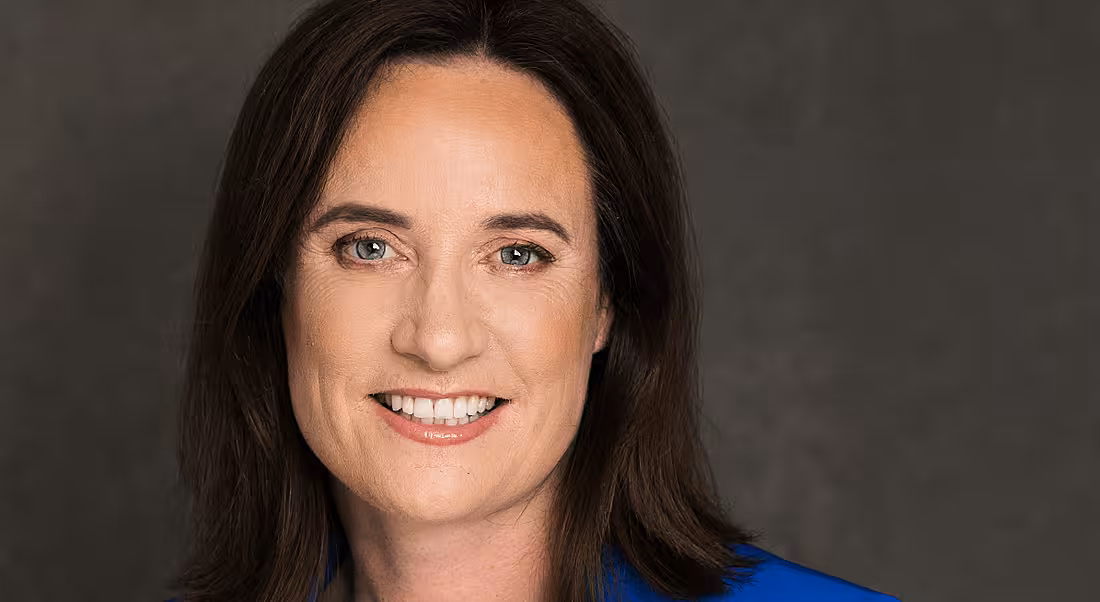 Claire Fitzpatrick of ConsenSys is smiling into the camera.