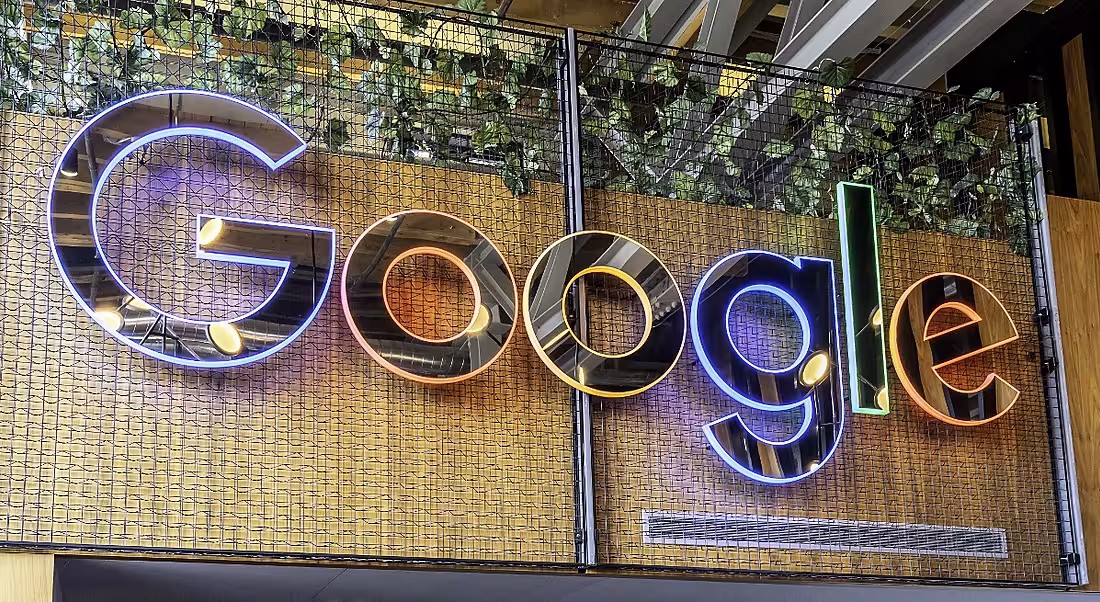 Colourful Google sign on a company wall.