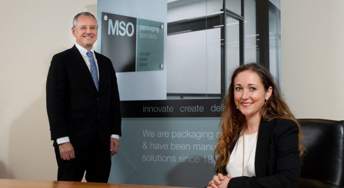 MSO Cleland MD and Invest Northern Ireland CEO are together in an office and smiling into the camera.