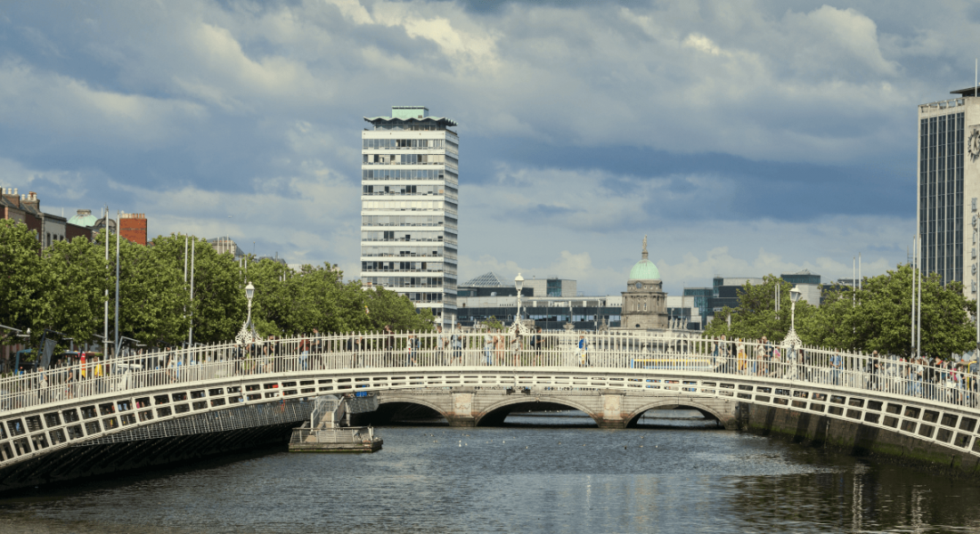 The Liffey river in Dublin, with bridges and buildings in the background.