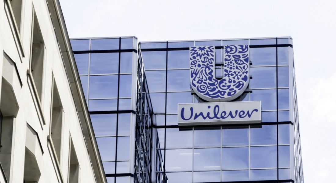 The Unilever headquarters building in Toronto, Canada against a cloudy sky.