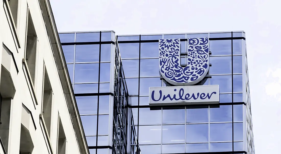 The Unilever headquarters building in Toronto, Canada against a cloudy sky.