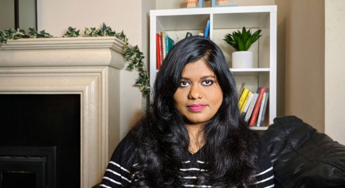 Cindhu Vinayagamoorthy relaxes on the couch in her new home in Galway.