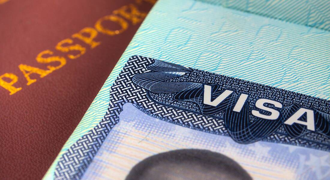 Close-up of a passport and US visa.