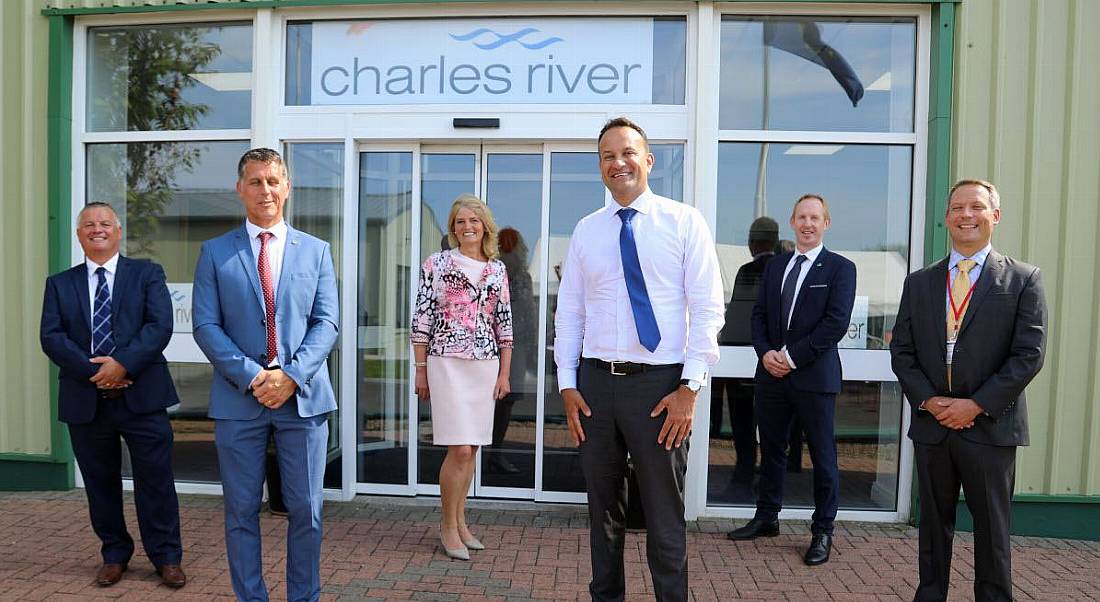 Six people, including Tánaiste Leo Varadkar stands with five other people outside the Charles River office.