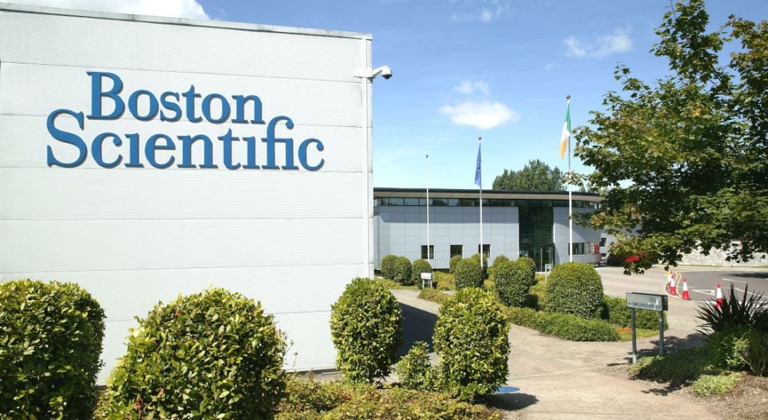 A large building that has Boston Scientific written on the side of it.