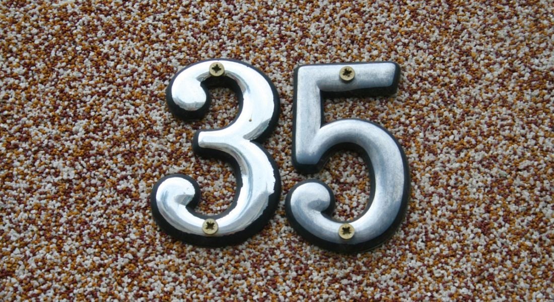 Silver number 35 against a pebble-dashed background.