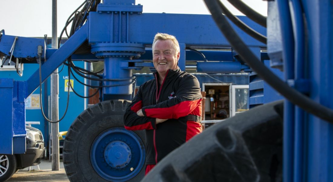 Pearse Flynn, founder of Green Rebel Marine, is standing outside with offshore windfarm equipment.