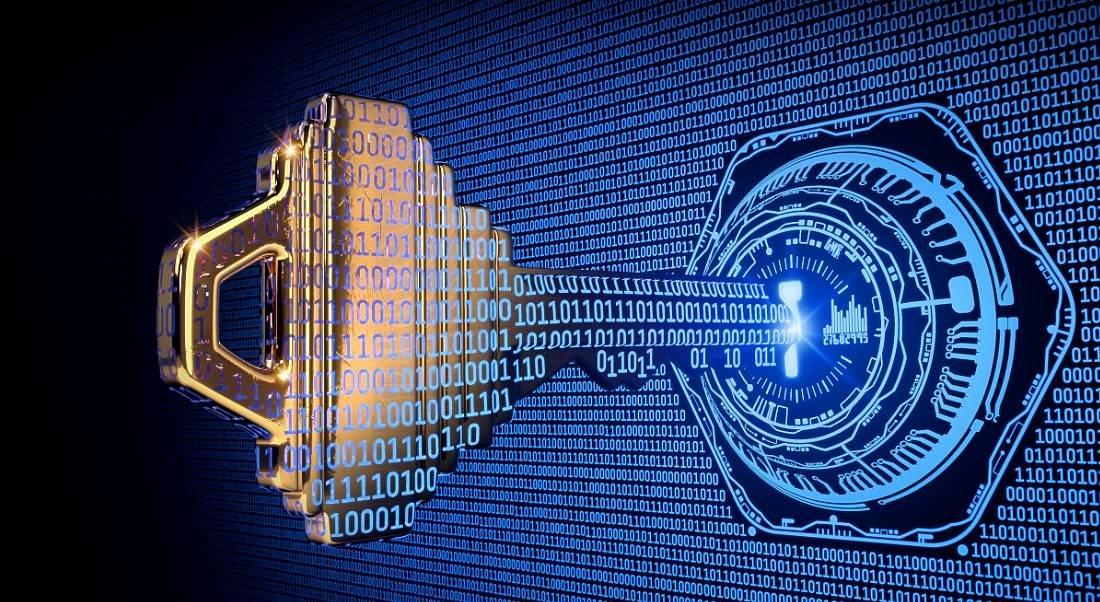 Giant key in keyhole, surrounded by lines of code in a cybersecurity concept.