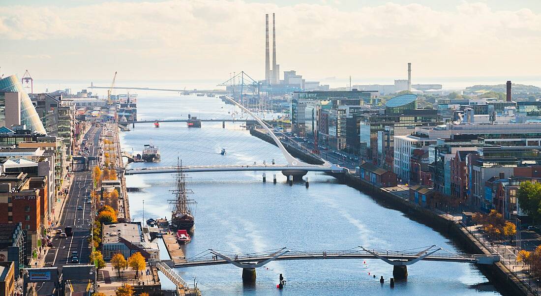 Scenic picture of Dublin city's skyline featuring the Liffey river.