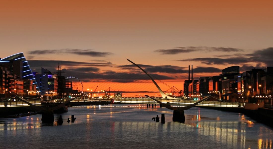 Sunrise over the river Liffey in Dublin, showing offices around the docklands area.