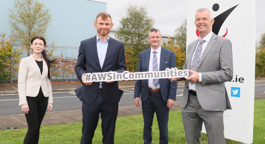 Joanne Reynolds and Mark Finlay of AWS with Martin O’Brien and Davy McDonnell of DIFE launching the course in Drogheda. They are standing outside and holding an AWS sign.