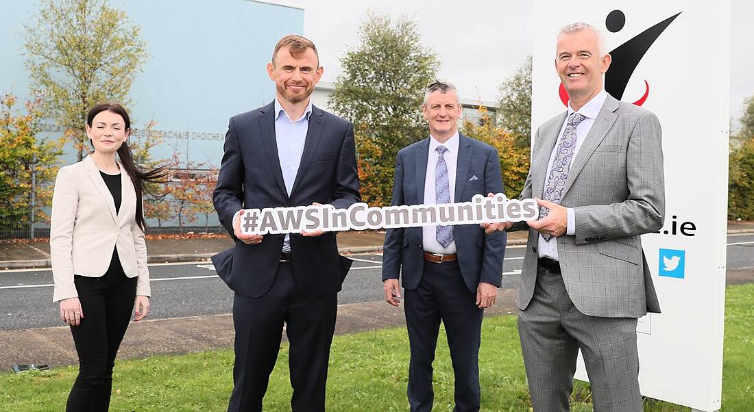 Joanne Reynolds and Mark Finlay of AWS with Martin O’Brien and Davy McDonnell of DIFE launching the course in Drogheda. They are standing outside and holding an AWS sign.