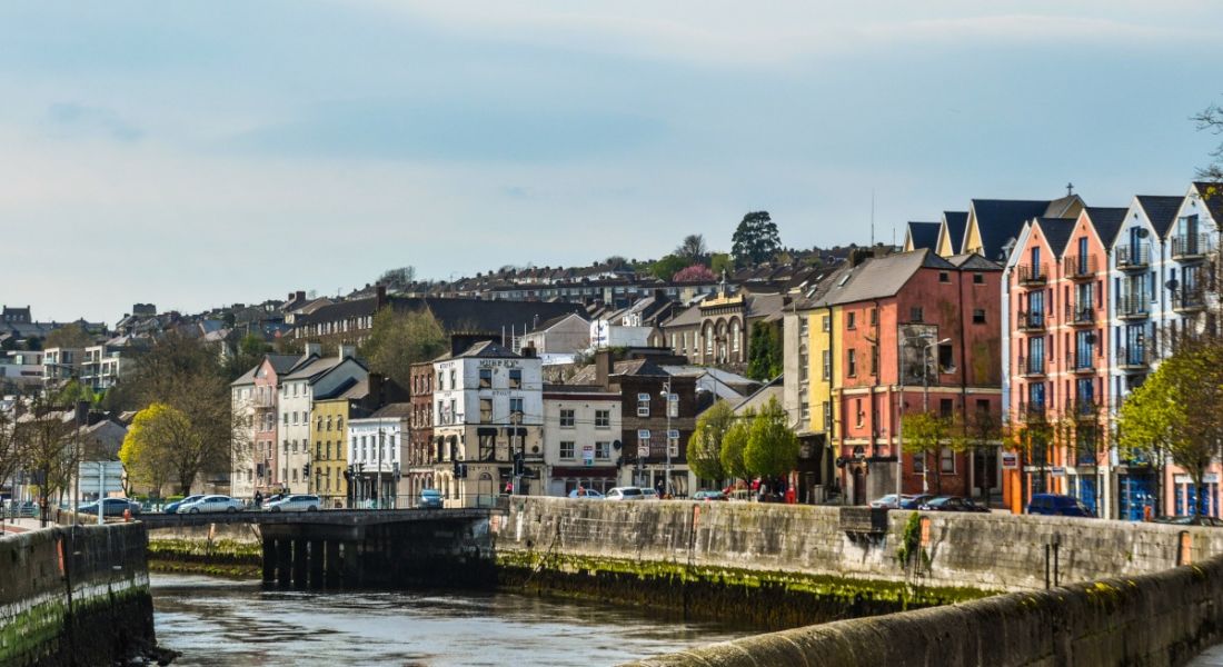 Scenic shot of houses and buildings along the river Lee in Cork City.