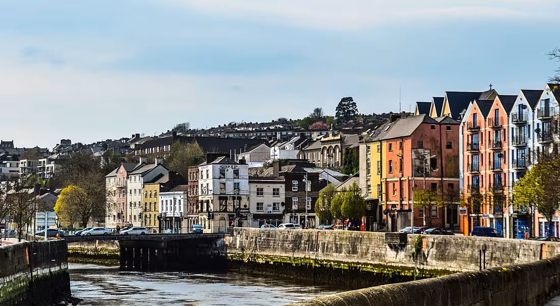 Scenic shot of houses and buildings along the river Lee in Cork City.