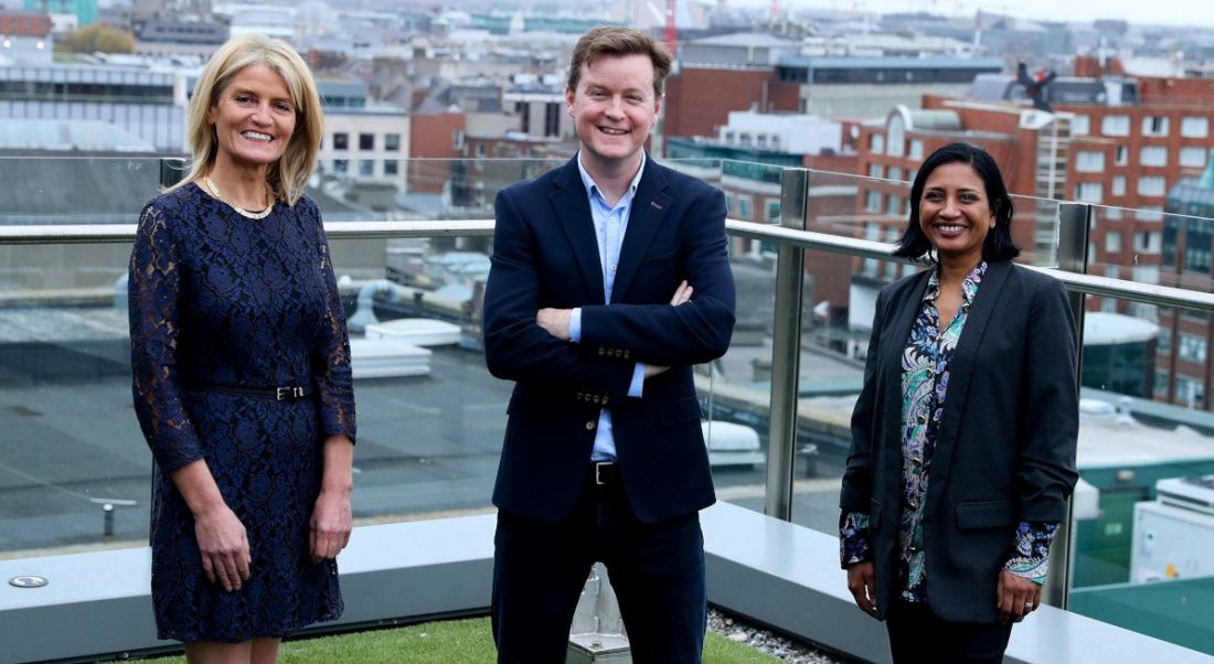 Mary Buckley, executive director of IDA, with Colm O'Cuinneain of Greenhouse and Renu Jhugaroo of Greenhouse on the roof of an office overlooking Dublin's city centre.