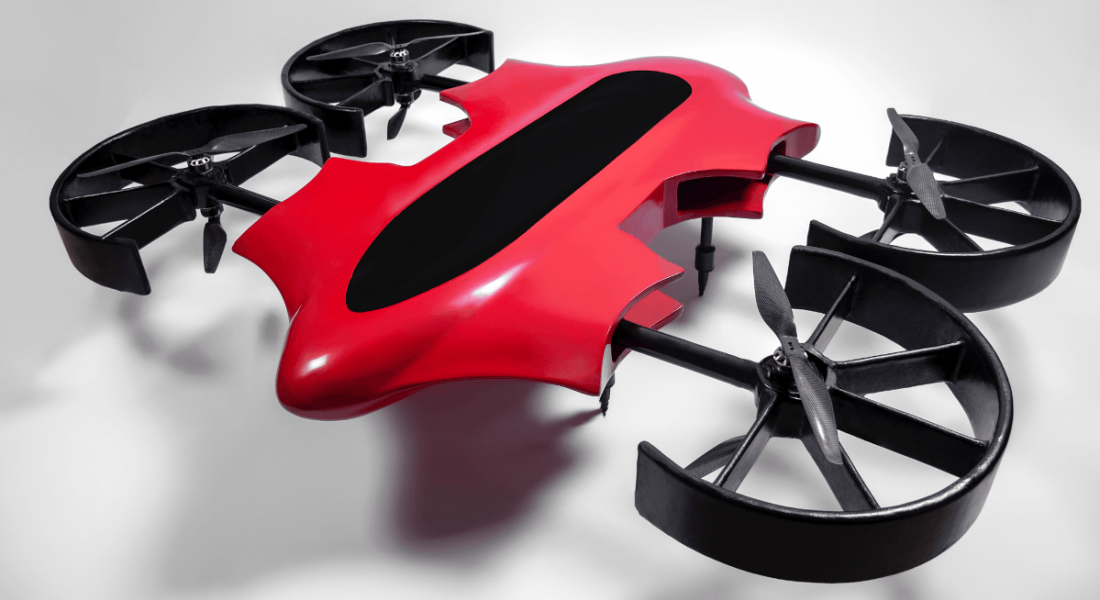 The ZenaDrone 1000 which is red and black pictured on a plain background.
