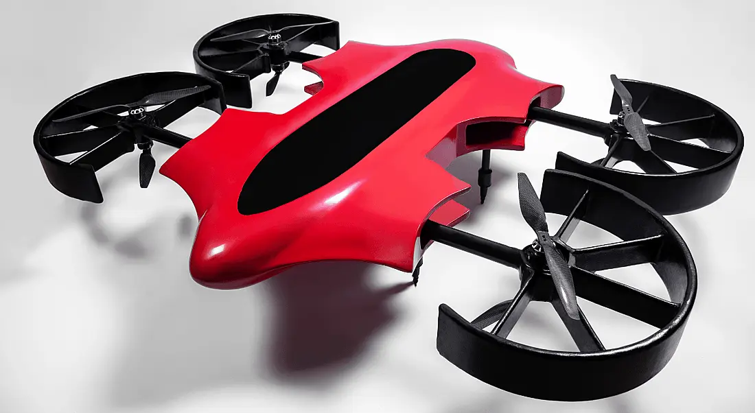 The ZenaDrone 1000 which is red and black pictured on a plain background.