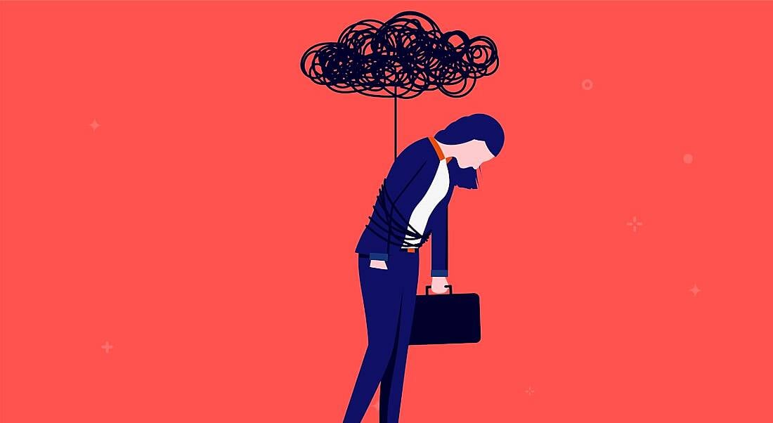 A cartoon image of a woman in business attire walking but slouched. There is a black cloud above her tied to her waist, symbolising brain fog.