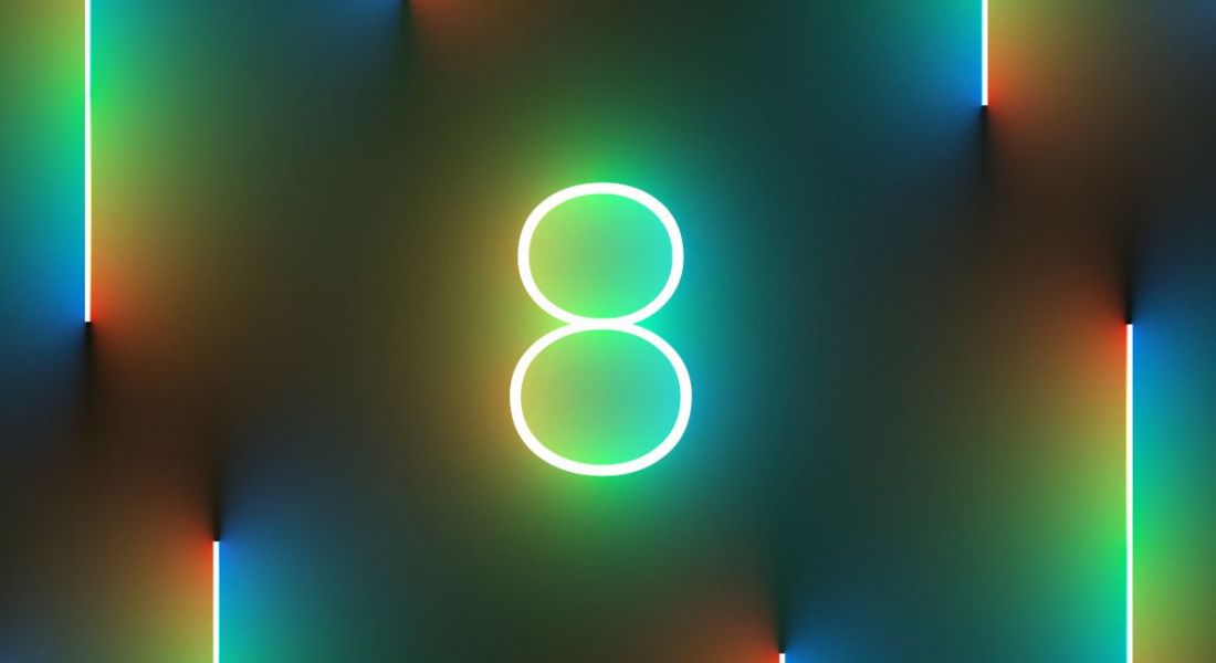 A neon light in the shape of a number eight.