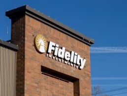 Headshot of a man looking into the camera in the reception of Fidelity Investments.
