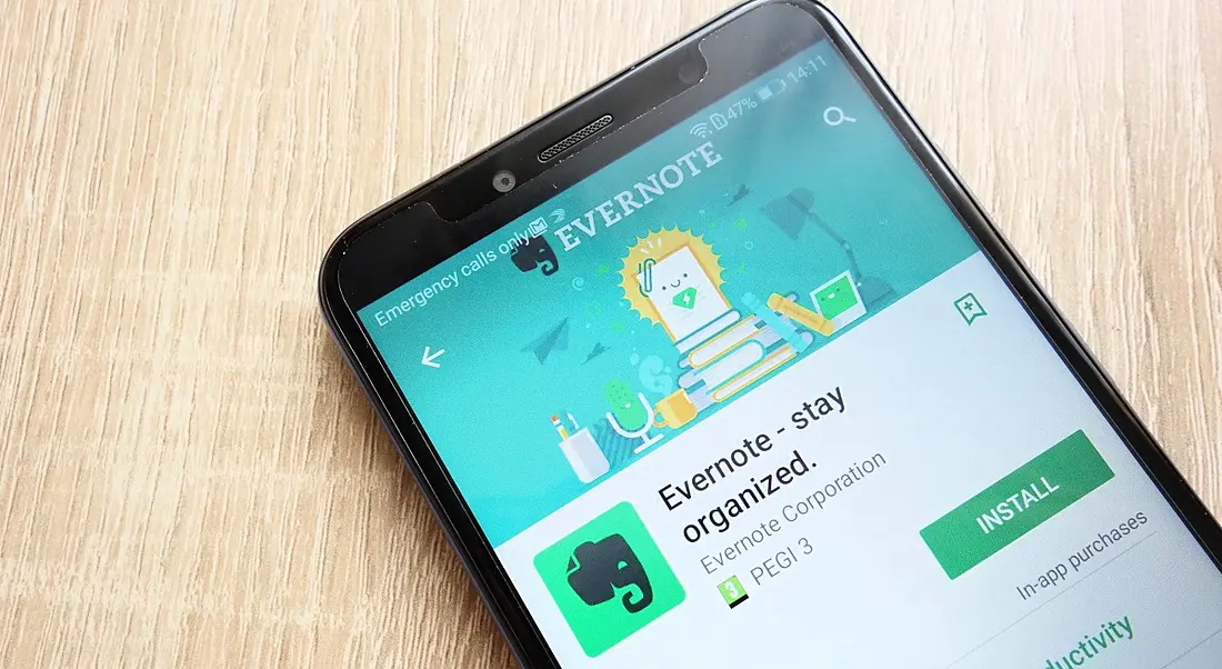 A smartphone displaying the Evernote app install page on Google Play store.