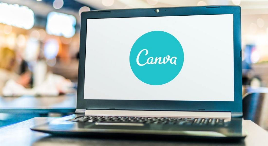 A laptop with the Canva logo open on the screen.