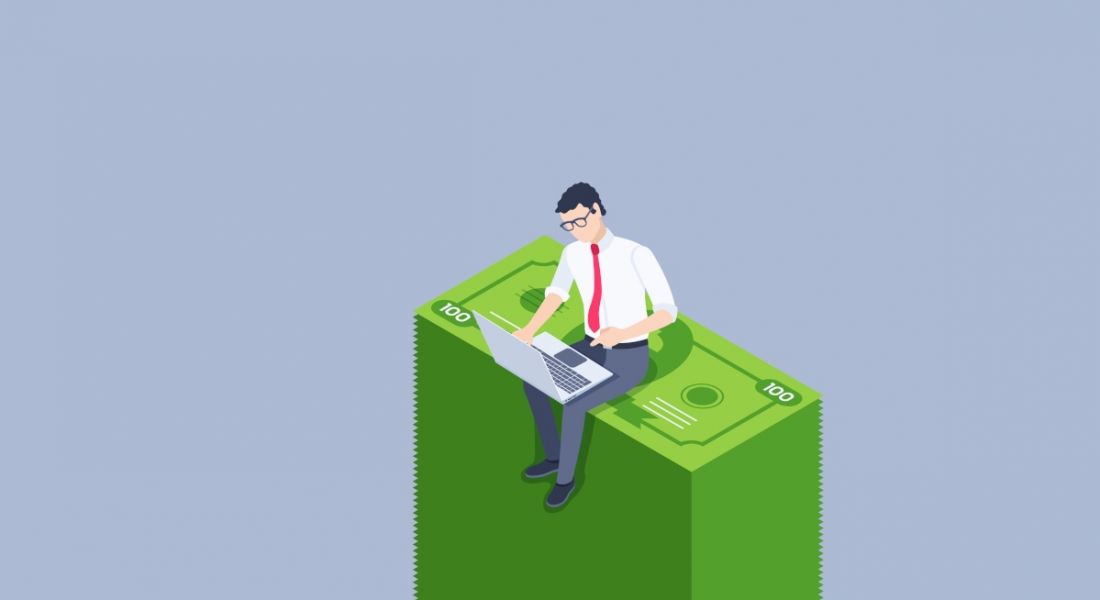 Cartoon showing a highly paid tech worker sitting on a pile of giant green US dollars while working on a laptop.