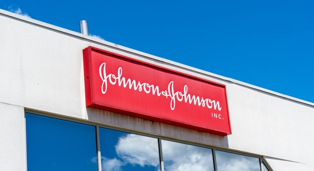 Johnson & Johnson logo in red on a white building.