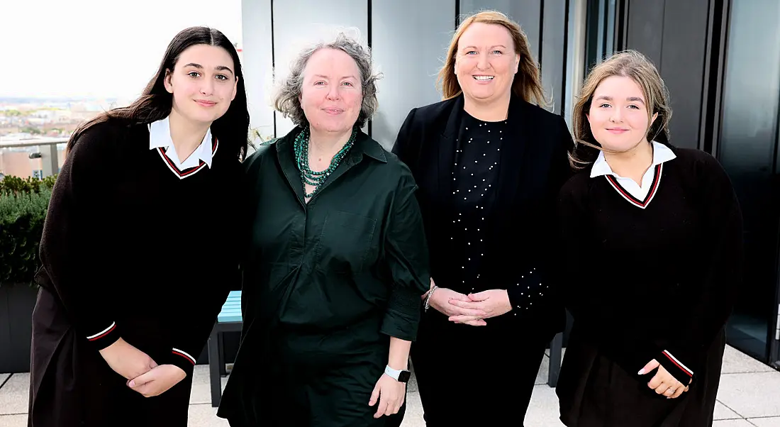 Two women flanked by two teenage girls, all standing in a row following Google and CodePlus' partnership announcement.