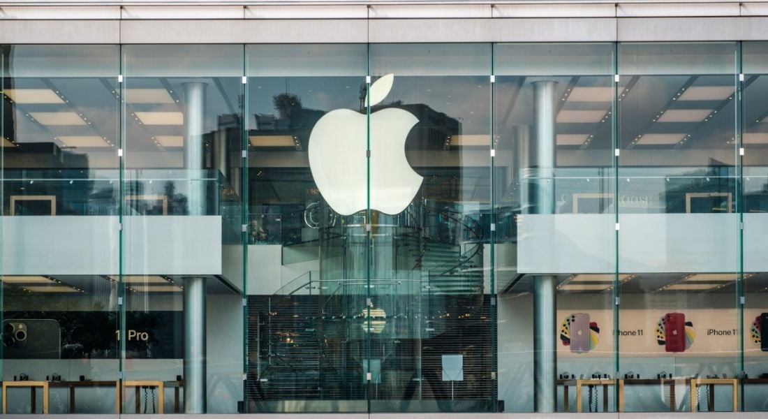 The Apple store front with the logo on glass.