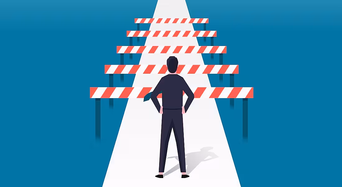 Man facing barriers on a path. Cartoon inaccessibility concept.