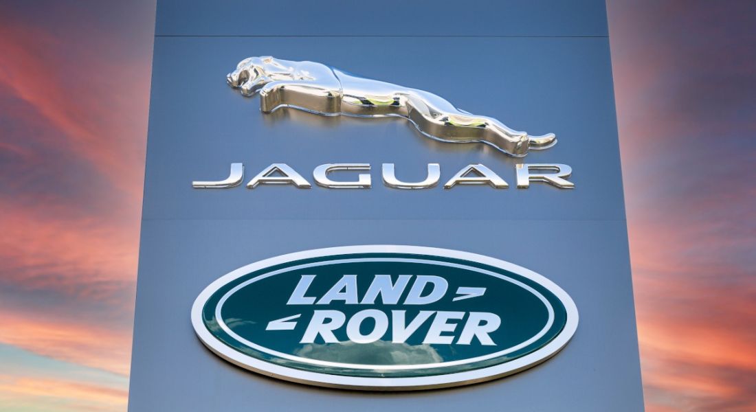 Jaguar Land Rover logo on a sign.