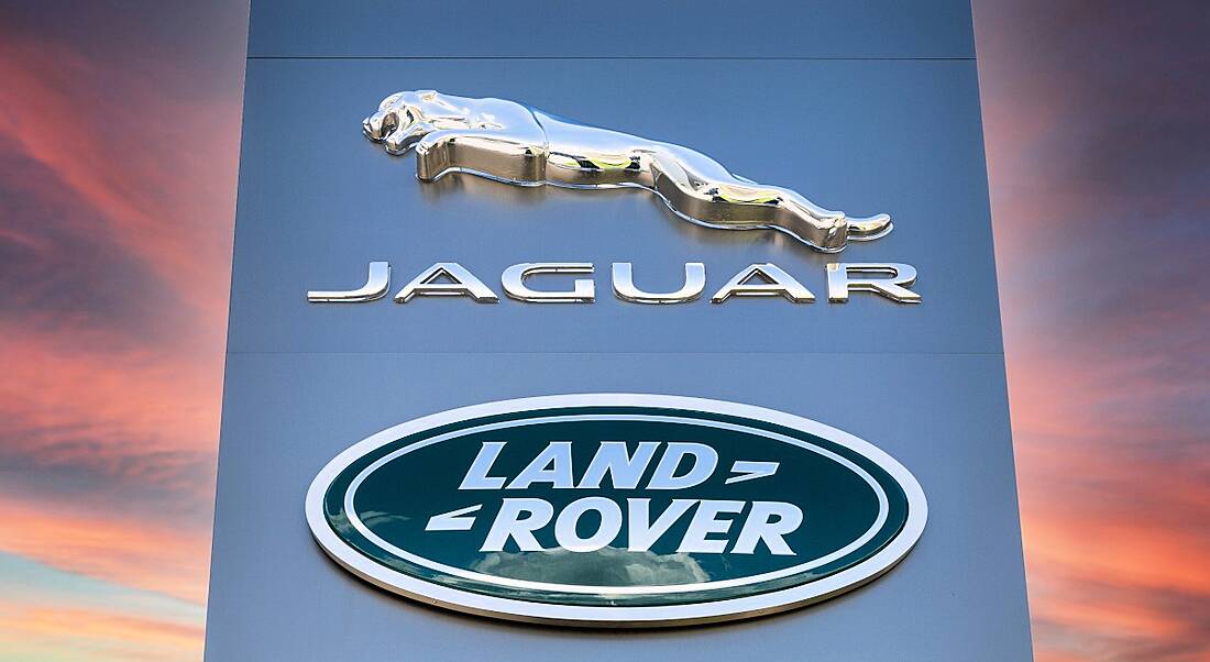 Jaguar Land Rover logo on a sign.