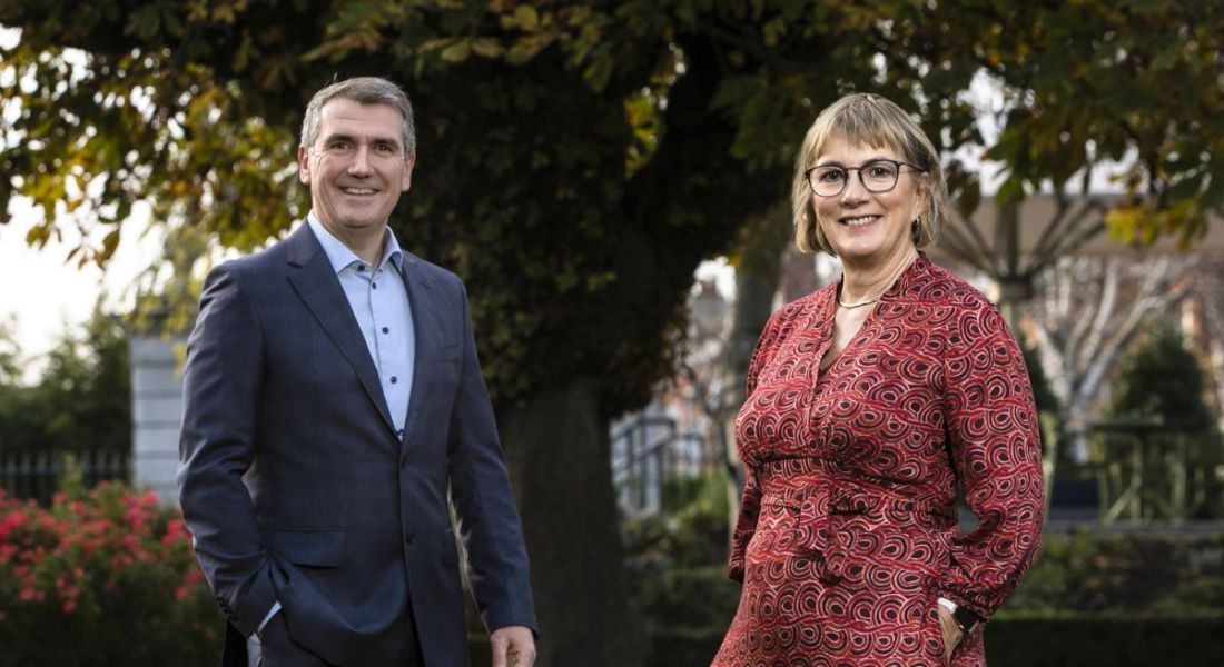 Balance for Better Business co-chairs Aongus Hegarty and Julie Sinnamon standing outside beneath a tree.