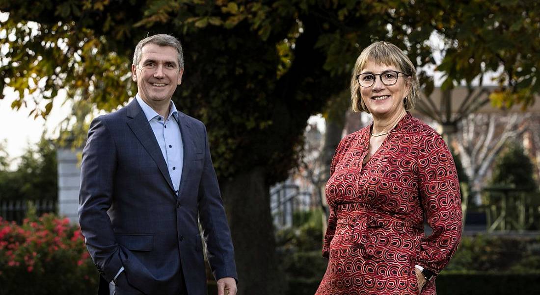 Balance for Better Business co-chairs Aongus Hegarty and Julie Sinnamon standing outside beneath a tree.