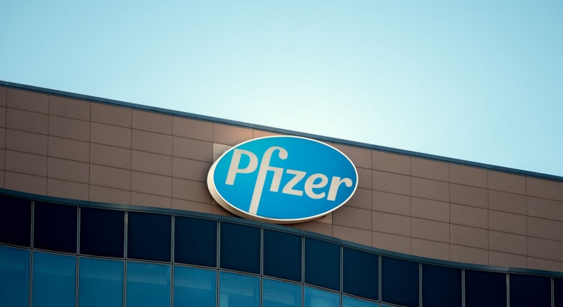 The Pfizer logo on a company facility.