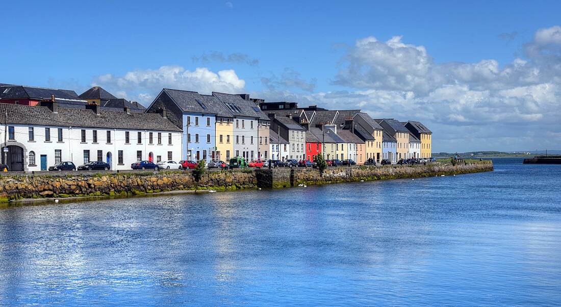 A view of the Claddagh in Galway with colourful houses on the quay.