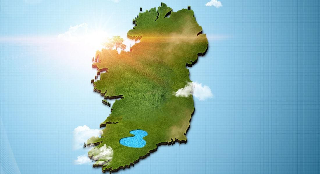 Aerial photorealistic view of Ireland in green on a sky background.