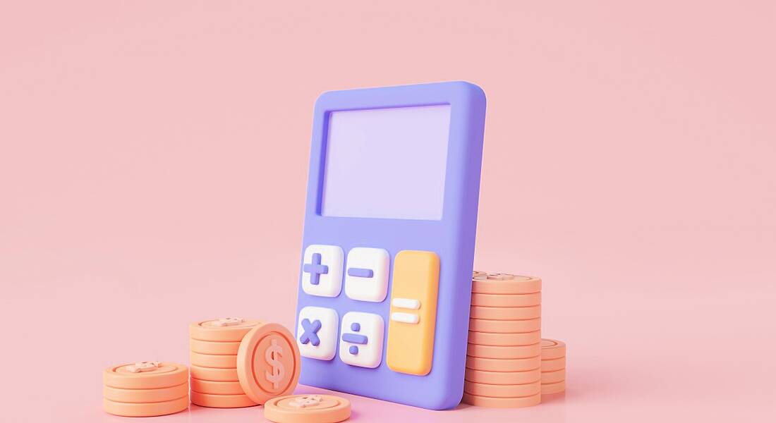 Purple calculator with white and yellow buttons and cartoon dollar coins arranged in a stack beside it.