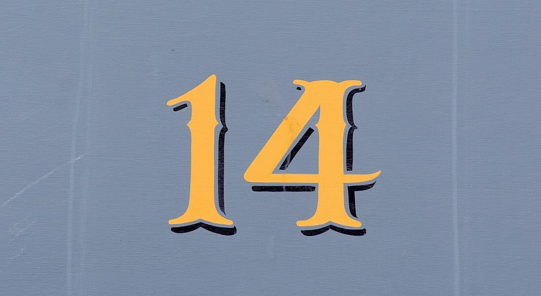 Gold number 14 on a greyish-blue background.