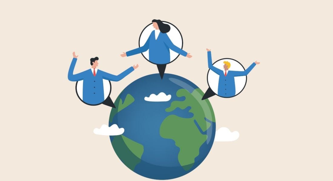 Cartoon showing international colleagues collaborating together, they are appearing out of a globe and talking to each other.